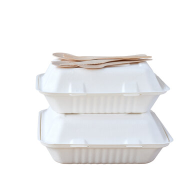 Biodegradable take out food containers and bamboo cutlery isolated cutout on transparent
