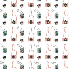 Seamless pattern with vintage photo cameras