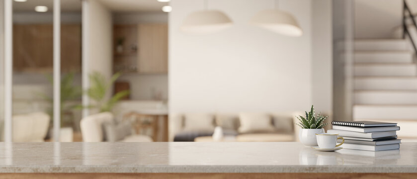 Empty space on a tabletop with a blurred modern Scandinavian living room in the background.