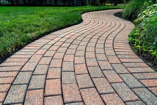 Brick pavers arranged in a curving pattern.