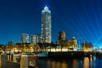 Photo sur Plexiglas Pont Érasme Panoramic view of the night city. Rotterdam city skyline. City towers illuminated panorama. Netherlands