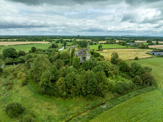Aerial view of Lea Castle ruined medieval castle of the FitzGerald family with 4 storey donjon and gate house near Portarlington, County Laois