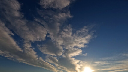beautiful sunset goldish clouds on the sky background - photo of nature