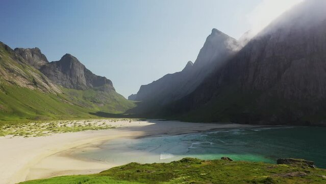 Rotating drone shot of Horseid Beach with turquoise blue water and private beach. Northern side of Moskenes&oslash;y, in the western part of Lofoten
