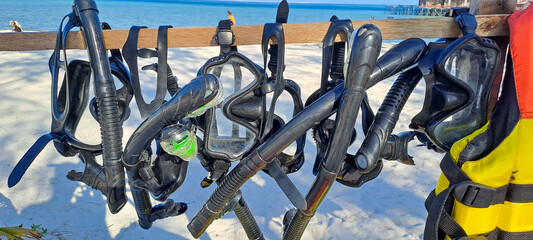 Rental snorkels hanging at a shop or service for tourist on the Beach