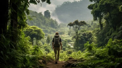 Foto auf Leinwand Backpacker walking through the jungle of Nepal © Sasint