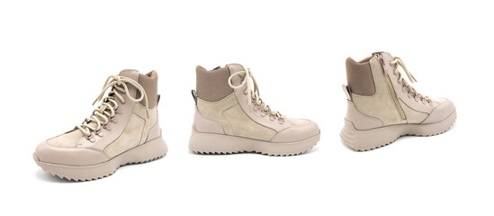 Fashionable suede leather boots isolated on white background. View from all sides.