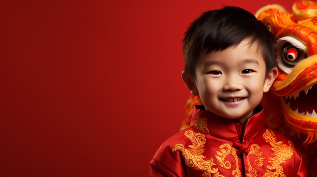 Little Asian Boy In Red Dragon Costume On Red Background With Space For Text