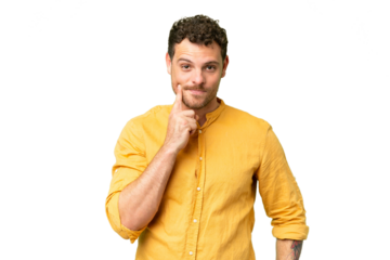 Brazilian man over isolated chroma key background and thinking