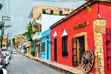 Colorful colonial houses in Santo Domingo, the capital of Dominican Republic - obrazy, fototapety, plakaty