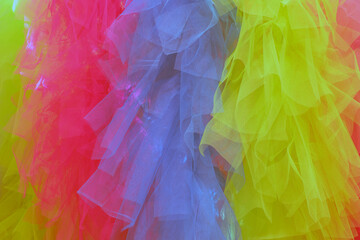 Vibrant Textured Net Fabric: Pretty Fabric with Different Colors and Patterns for Striking Background Use.