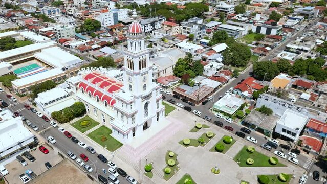 Aerial orbiting shot of Sacred Heart of Jesus (Corazon Sagrado de Jesus) Church in Moca, Dominican Republic