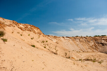 Fototapeta na wymiar sand pit against the blue sky