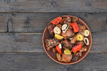 meat kebab with vegetables in a plate.