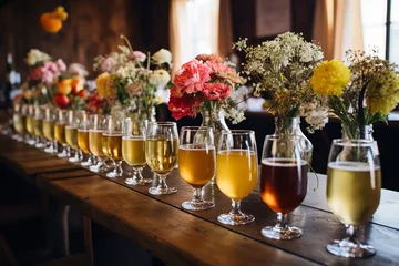 Foto op Plexiglas A rustic table arrangement features various cider flavors in clear glasses, each inviting attendees to embark on a tasting journey © Davivd