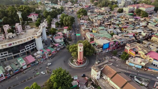 Aerial view of Buildings and Traffic in Ghantaghar Dehradun, Uttarakhand, Indian City, 4K, Drone shot of Indian Houses in a smart city.
