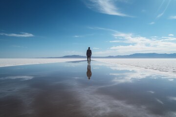 Salt lake reflection man. Generate Ai