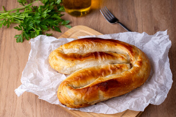 Turkish Kol Borek with minced meat serving