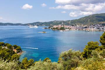 Fototapeta na wymiar Skiathos town with cruise ship vacation at the Mediterranean Sea Aegean island in Greece