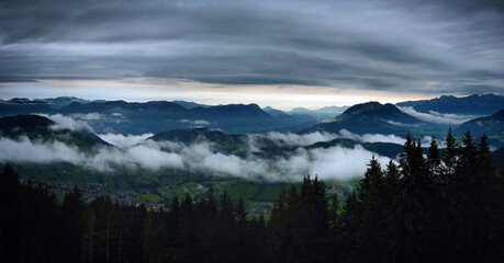 Obraz na płótnie Canvas Fog over the mountains in Wildschönau, Austria, July 2012