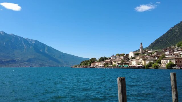 Panoramic view of Limone sul Garda with lake and mountains, Italy 