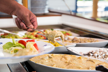 Variety dishes served buffet dinner. Mediterranean ketogenic diet, fish and vegetables. Healthy dinner restaurant buffet menu