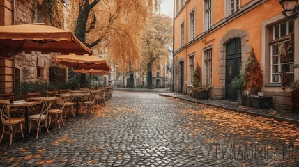 Cozy autumn cafe terrace with cobblestones and leaves