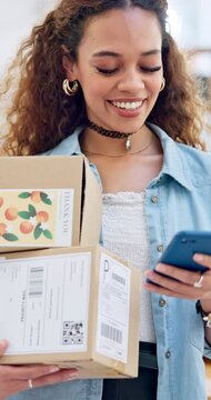 Ecommerce, happy woman with phone and boxes checking with email, reading sales or work at fashion startup. Online shopping, delivery and small business owner with digital app for orders at web shop.
