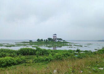 Fototapeta na wymiar Sareswar Beel is a shallow freshwater lake with abundant aquatic vegetation spread across the floodplains on the northern bank of Brahmaputra River in Lower Assam, India spread over a 1,700 hectares.