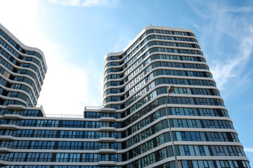 Fototapeta premium Modern corporate buildings against the blue sky. High-rise buildings in the Istanbul region. Blue skyscrapers of the business center