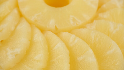 Sliced pieces of canned pineapple fruit