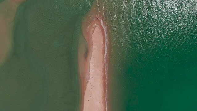Awaroa Abel Tasman National Park, New Zealand. Aerial Tracking Shot Of A Narrow Long Stretch Of Coastal Sand.