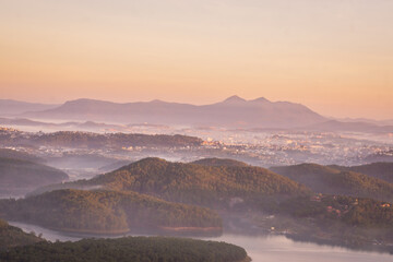 Early one morning, standing on the top of the mountain looking towards Da Lat city