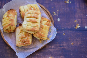 Fresh baked home made  Mini cheese puff pastries.Cheese pie with phyllo pastry and herbs