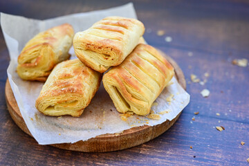 Fresh baked home made  Mini cheese puff pastries.Cheese pie with phyllo pastry and herbs