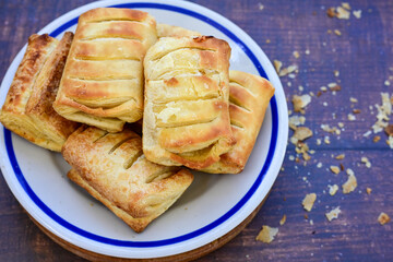 Fresh baked home made  Mini cheese puff pastries.Cheese pie with phyllo pastry and herbs