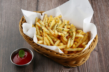 a wooden French fry and ketchup