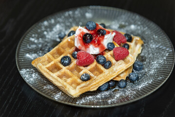 waffles with berries and ice cream