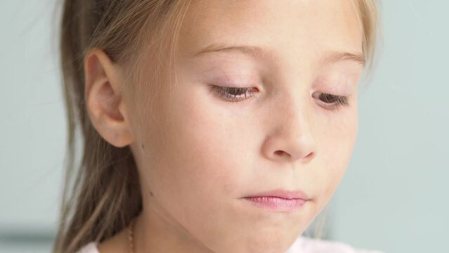 Children's teeth are large, with a dental plate. Bracket system on the teeth. Alignment of teeth with a dental plate. Malocclusion in a child. Crooked teeth. The concept of pediatric dentistry.