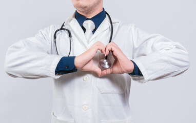 Doctor making heart gesture with hands. Concept of love and medicine, Doctor hands making heart shape isolated
