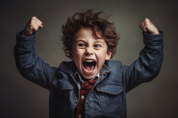 Close-up portrait photography of a joyful kid male gesturing victory against a cool gray background. With generative AI technology