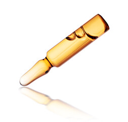 Medical or cosmetic ampoule with reflection close up on a white background