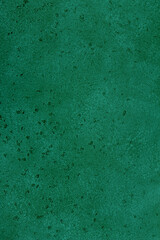 Green emerald stone background, wall or floor. Abstract texture for graphic design or wallpaper