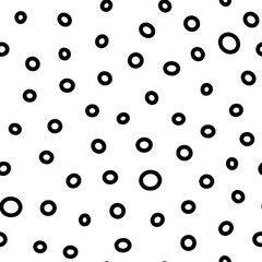 Seamless rings pattern. Black hand-drawn oval isolated on a white background. Doodle dots cozy ovate ornament. Vector dotted illustrations with circles for wallpaper, posters, wrapping paper, fabric