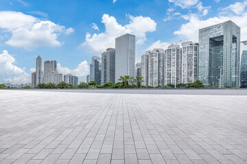 Empty square floor and city skyscrapers landscape in Guangdong, China