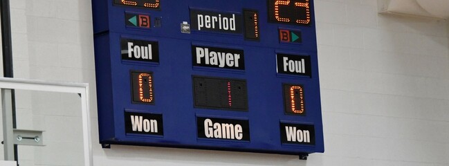 Blue Scoreboard on a Gym Wall