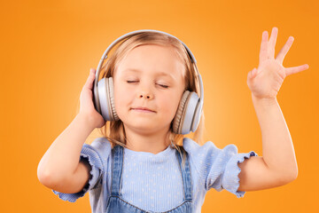 Child, headphones and dance to music in studio for freedom, multimedia subscription or kids podcast...