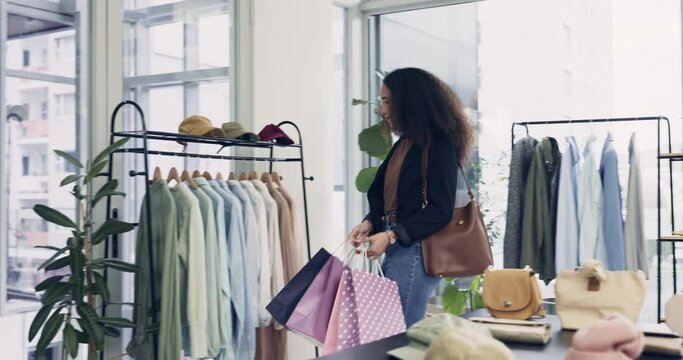 Woman, shopping and walking with bags in retail, store and sale in fashion with customer in shop with choice of clothing. Small business, boutique or person in mall with discount purchase of clothes