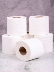 Toilet paper. Toilet paper rolls on gray background
