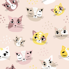 Vector seamless children's pattern with cat faces on a pink background. Suitable for baby prints, baby room decor, wallpapers, wrapping paper, stationery, scrapbooking, etc.